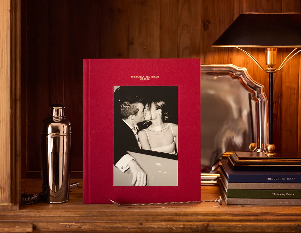 Signature Layflat photo book displayed on a shelf