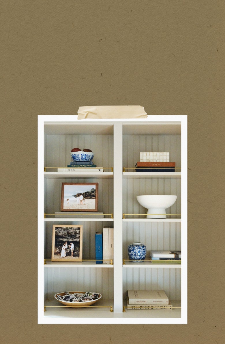 In home bookshelf featuring Banister Frame, Everyday Prints, and Photo Books.
