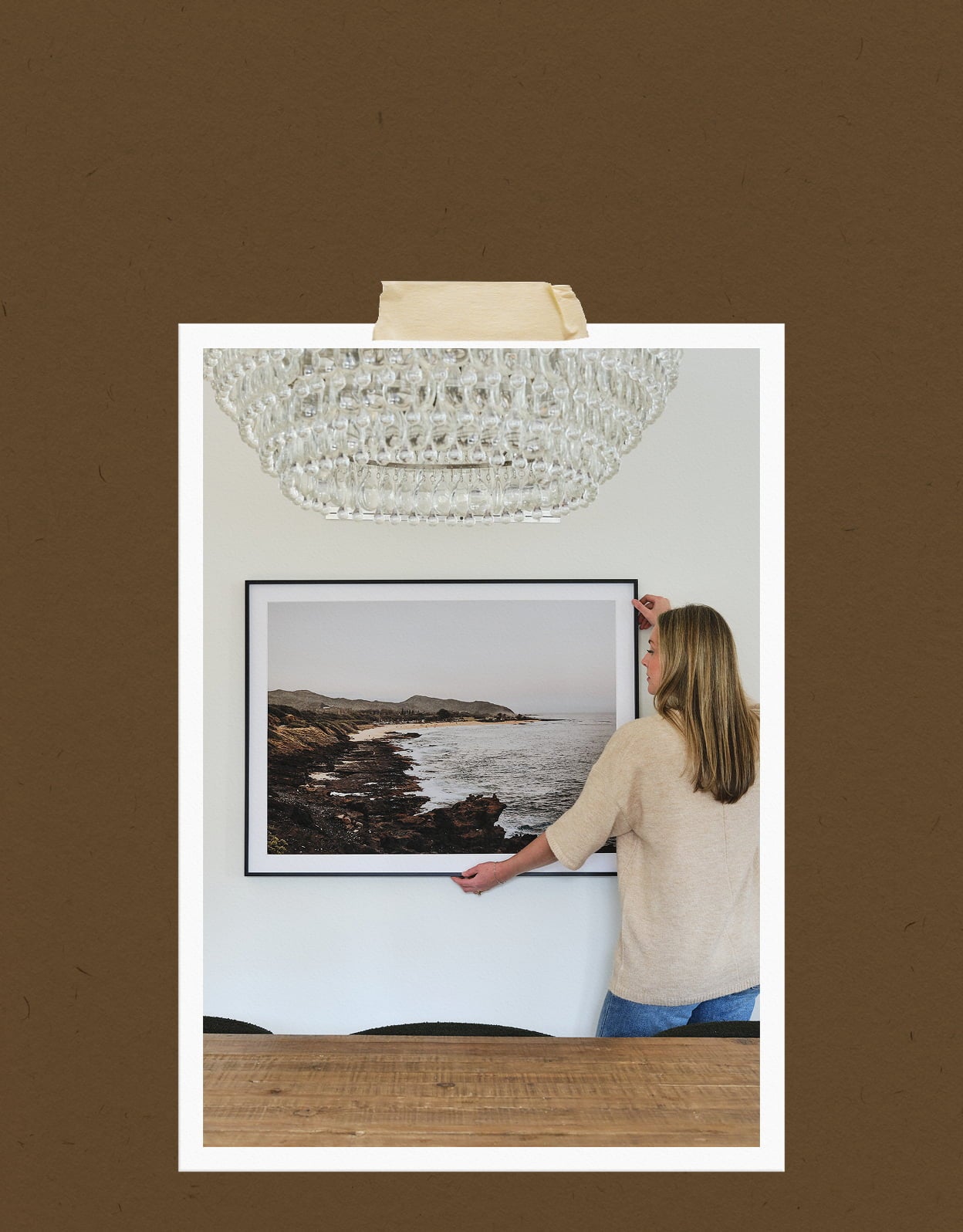 Modern Metal Frame in Black Finish, being hung up on wall.