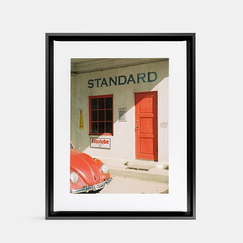 Framed Canvas Print in frame finish black.