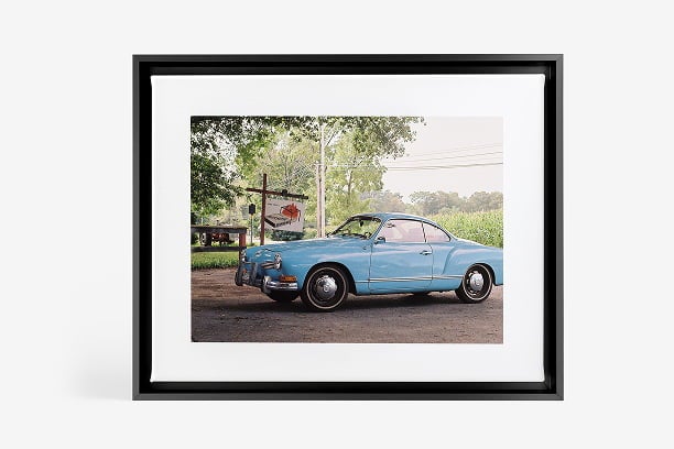 Framed Canvas Print in frame finish black.