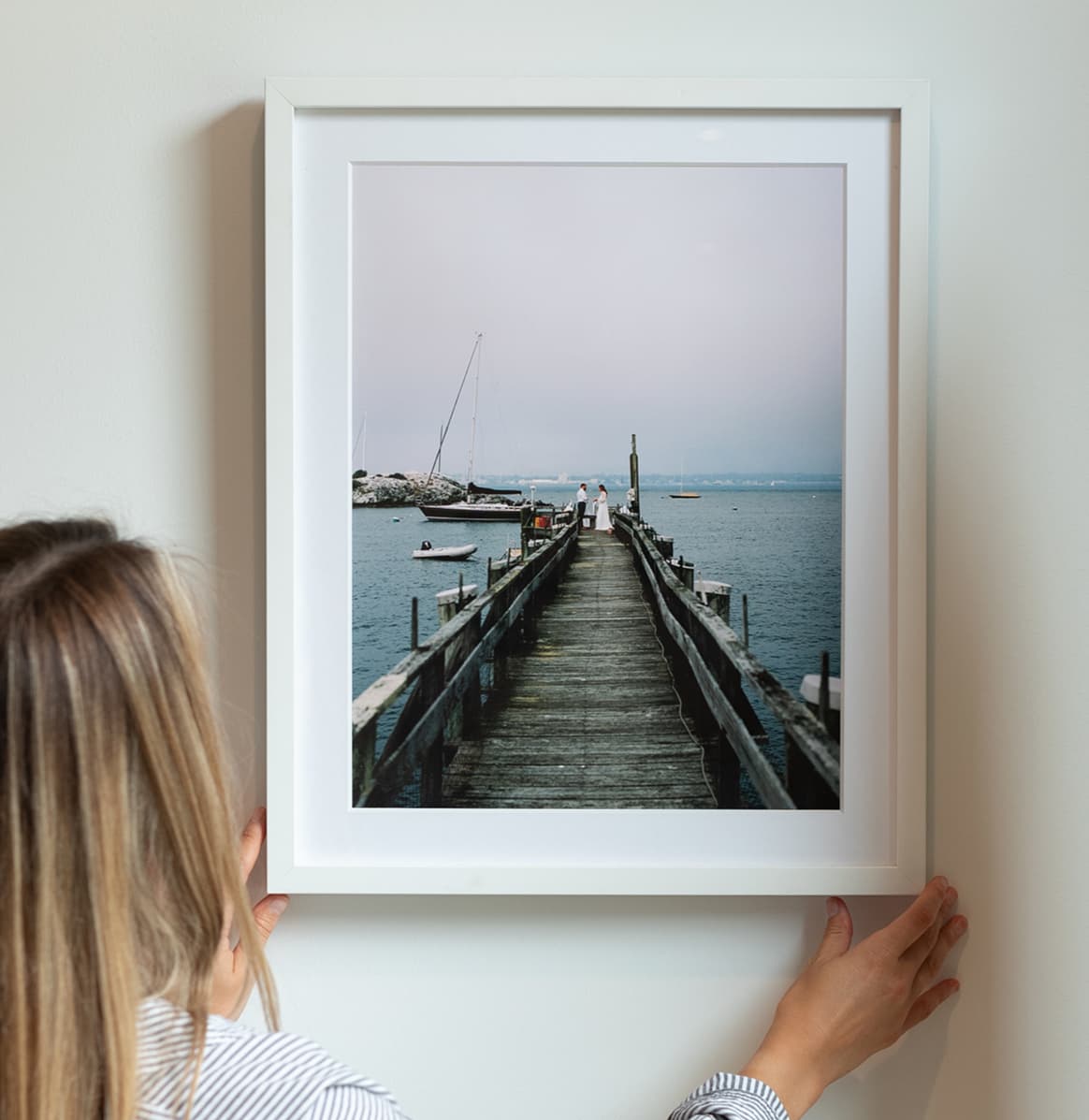 Framed summer travel photograph on a tabletop