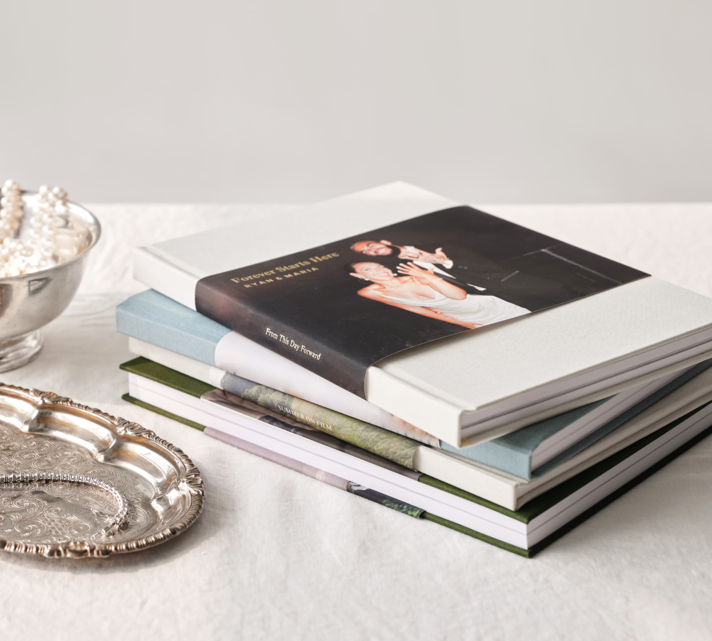 Stack of personalized wedding hardcover photo books