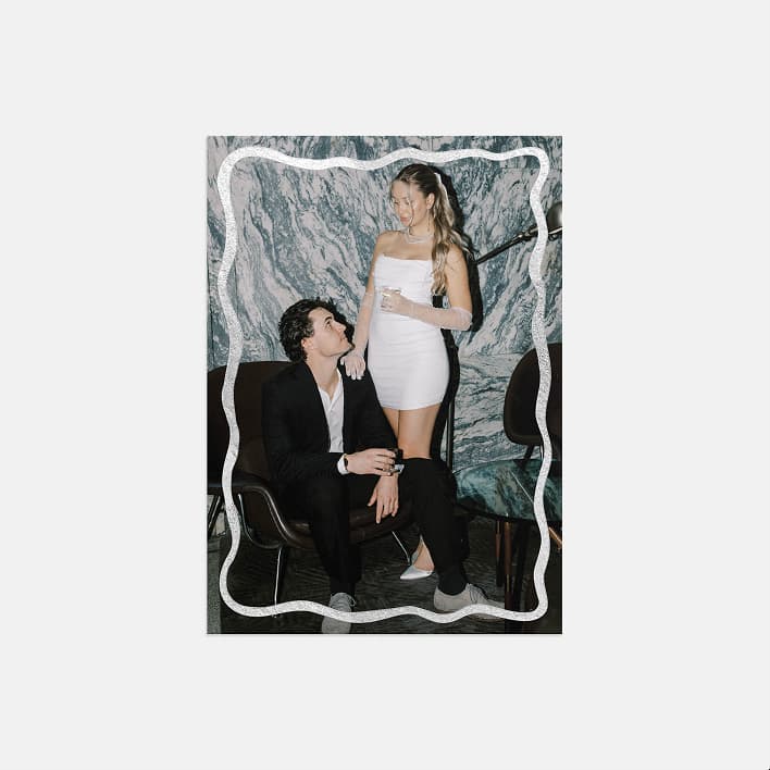 Wedding thank you card featuring a newlywed couple