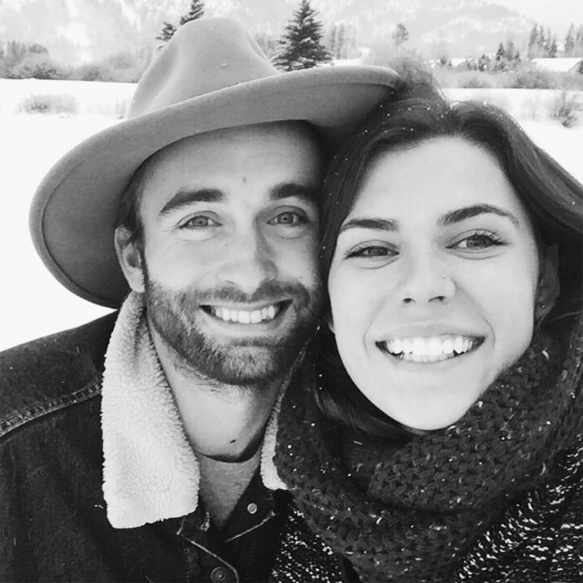 Couple posing for selfie on a snowy day
