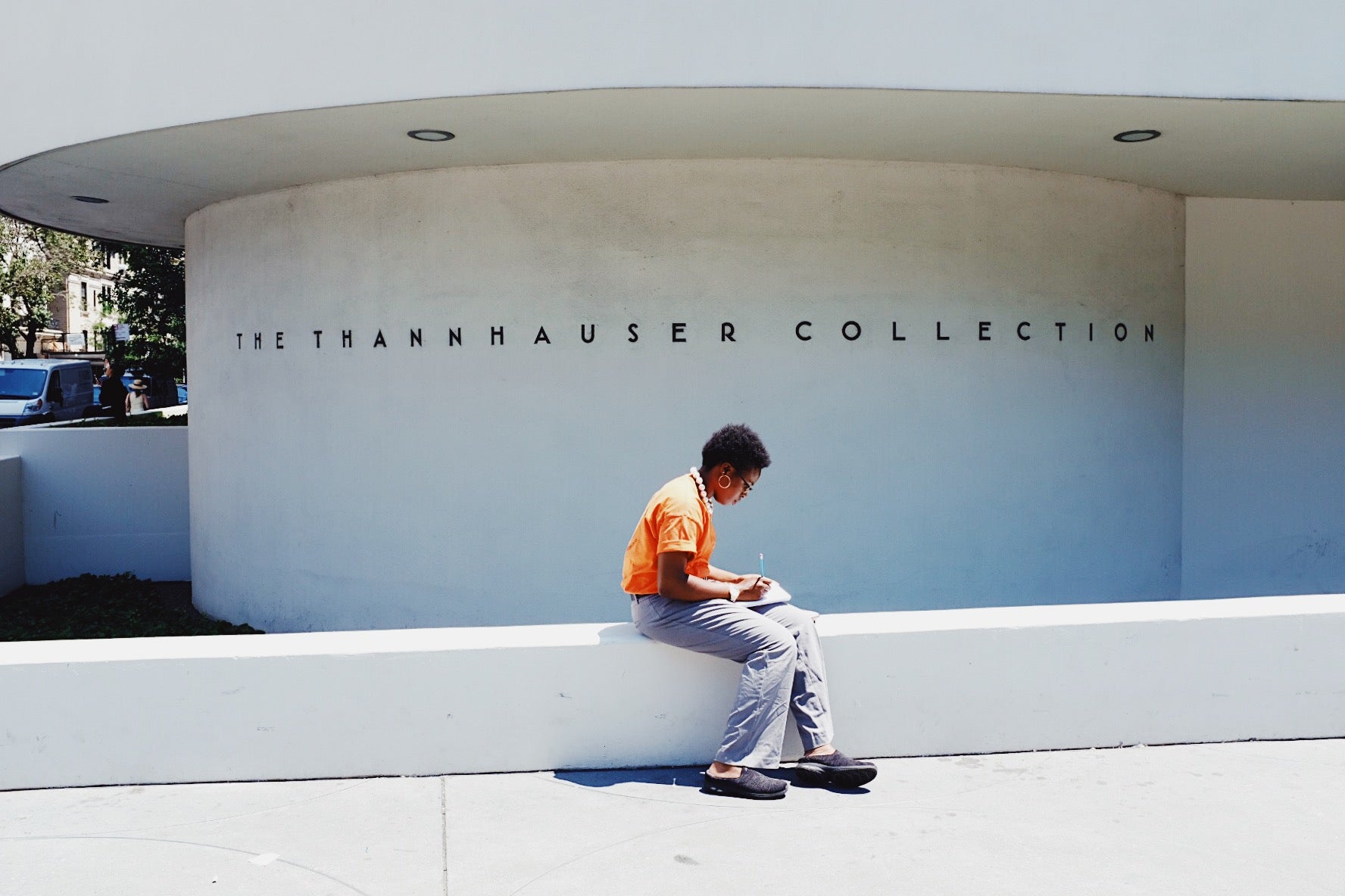 Lucy Laucht photo of boy sitting outside of museum