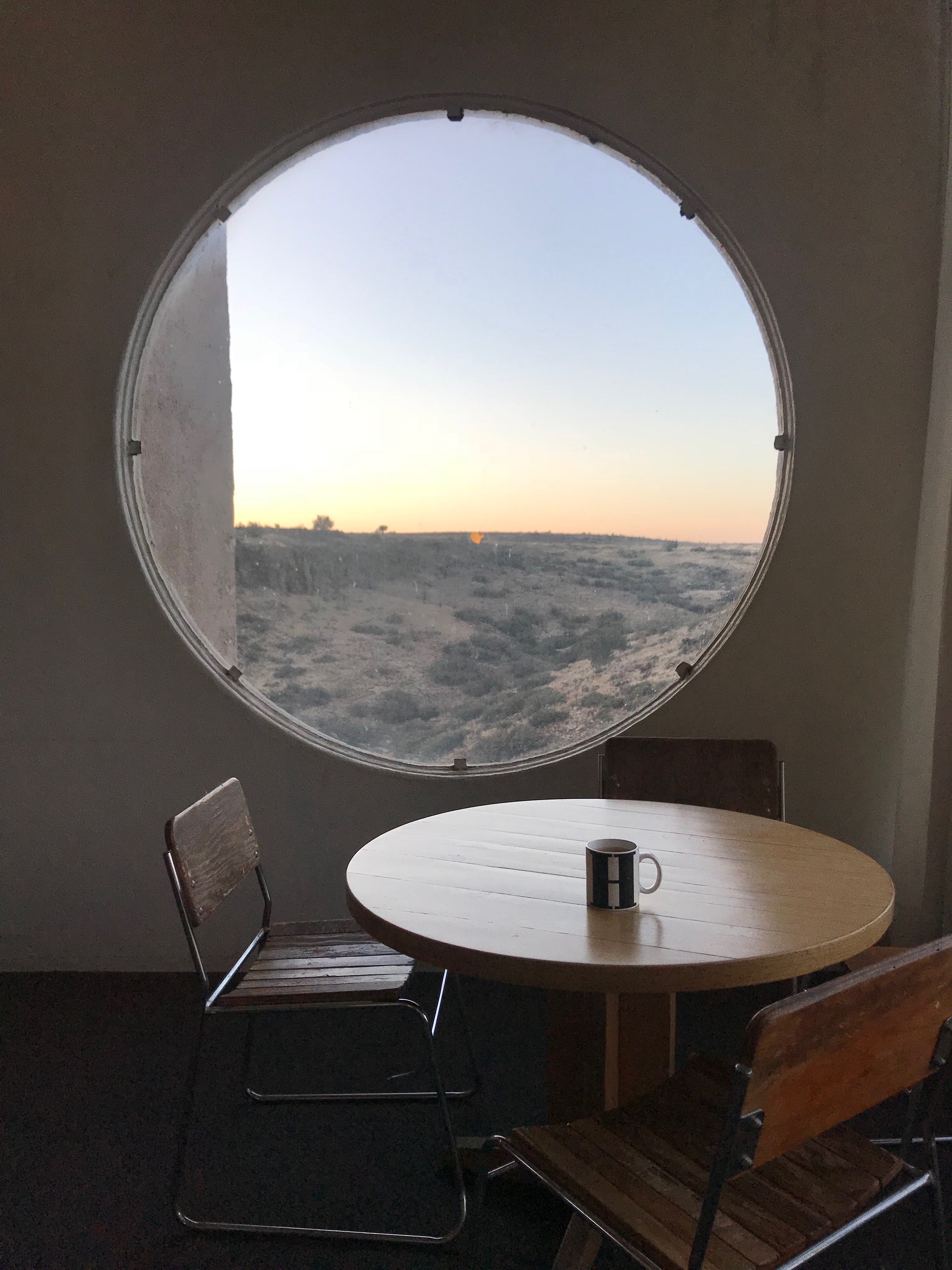 Lucy Laucht photo of light flooding room through circular window