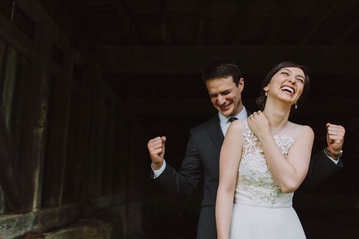 Photo of bride and groom celebrating