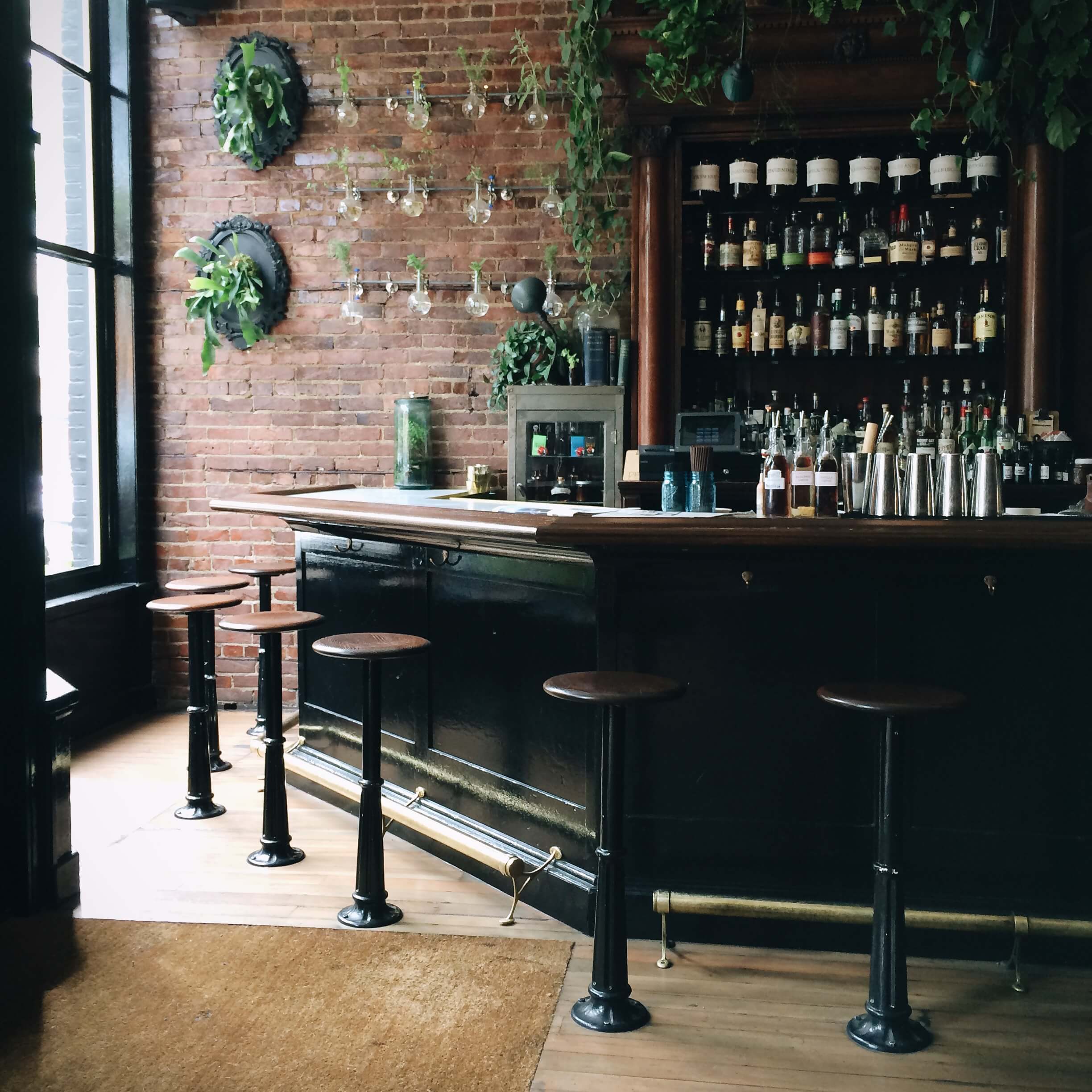 Photo of upscale bar top with light coming in through the window