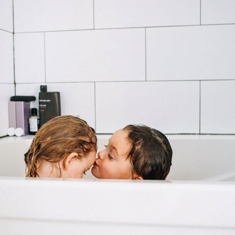 Photo of toddlers taking a bath from Days at Home album